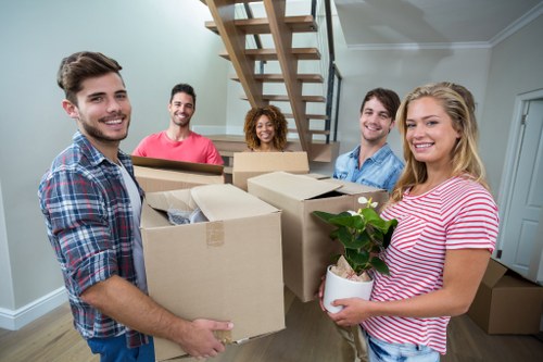 Students moving boxes during removals in Lambeth