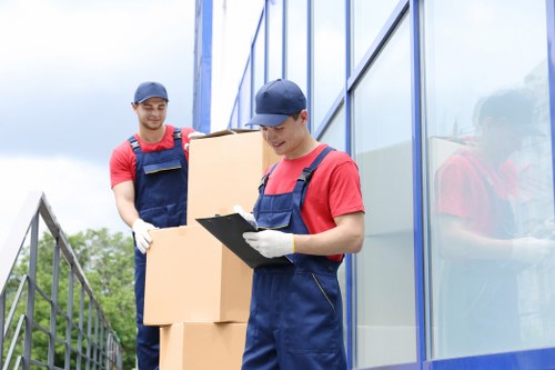 Worker checking load security during a removal job