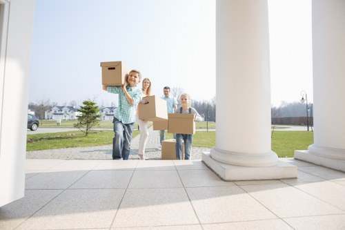 Professional movers loading furniture in Lambeth