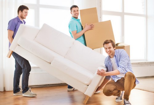 Local Lambeth removals team handling boxes and household items