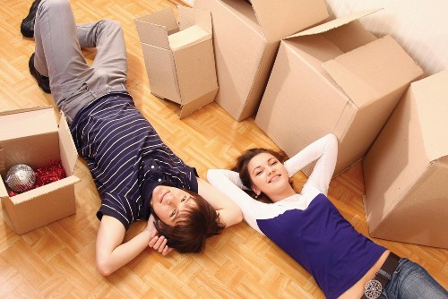 Staff carefully handling items with trained moving procedures