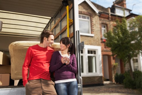 Van moving through busy Lambeth streets during a local job