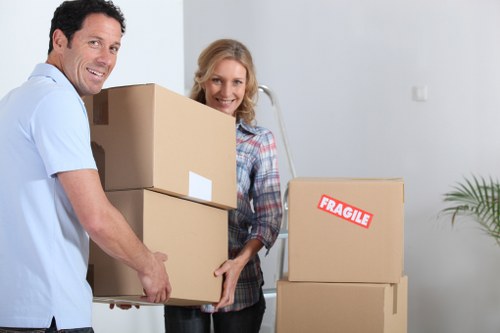 Team securing furniture safely inside a moving van